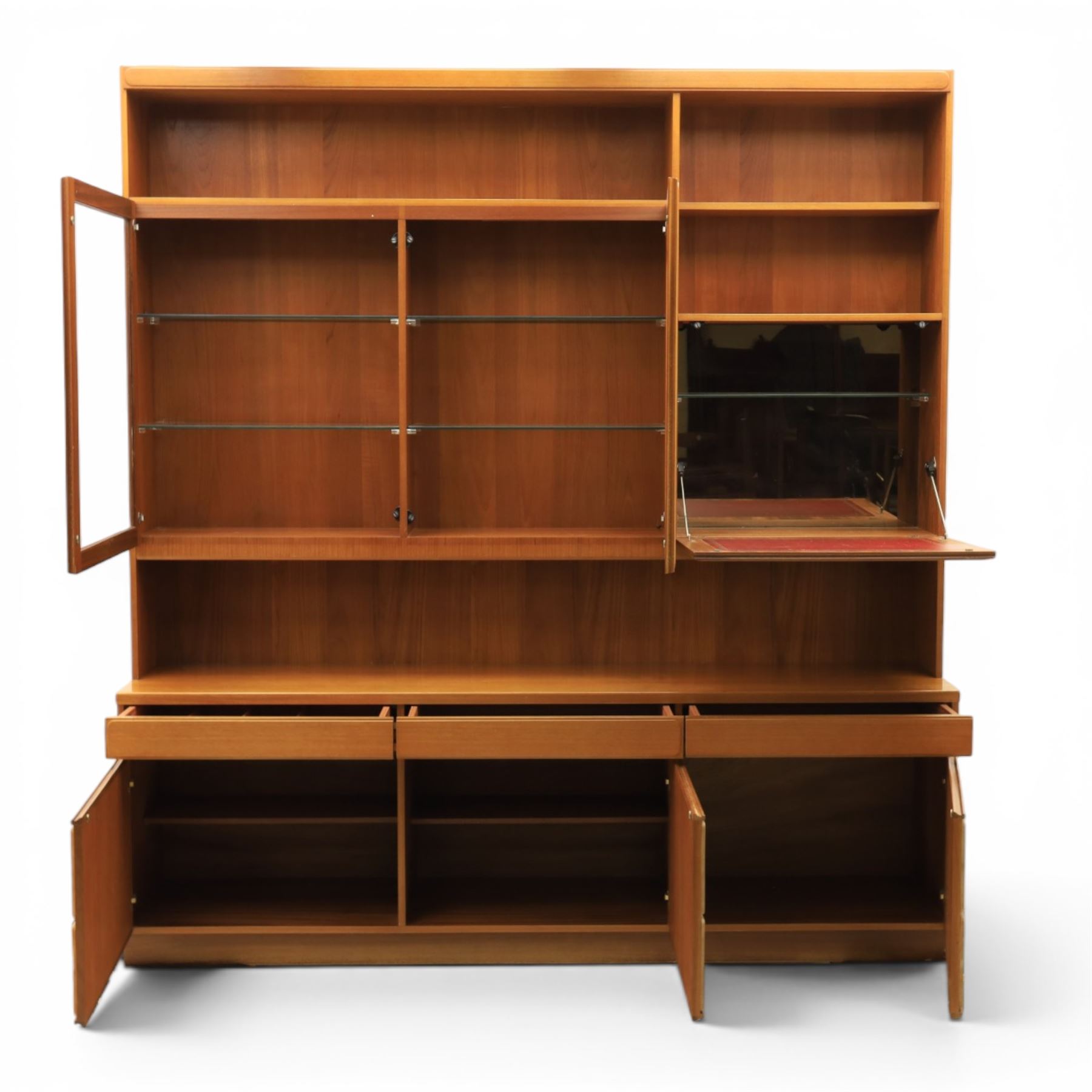 McIntosh Furniture - mid-20th century teak highboard unit, two glazed cupboards enclosing a glass shelved interior, a fall front cabinet to the other side mirrored back, with three frieze drawers one fitted for cutlery, with applied square panels