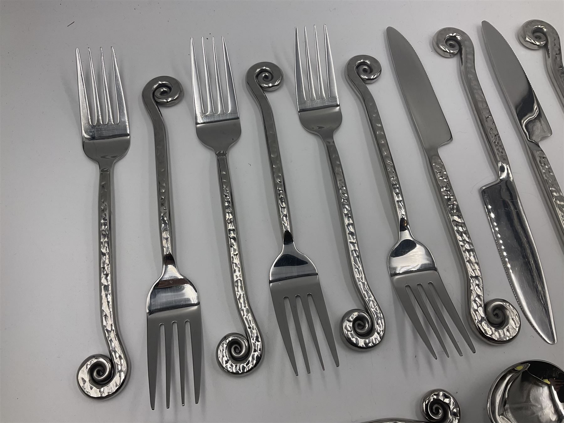 Artisan 24 piece stainless steel cutlery set in the Hammered Shell pattern