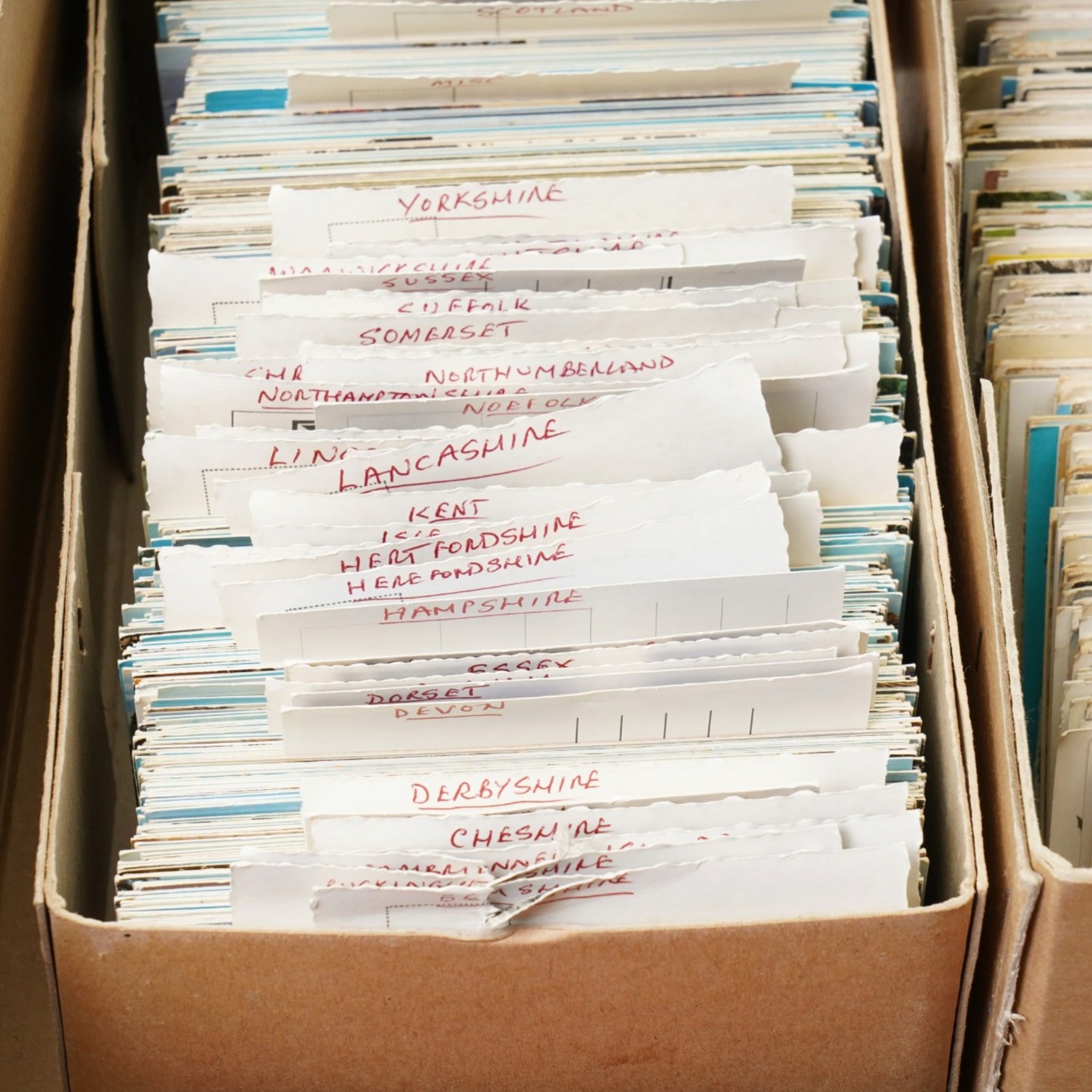 Large quantity of assorted postcards including 1950s and 60s GB topographical, novelty, comic, transport etc and an album of post office PHQ cards, over 2000 cards in total