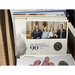 Approximately one hundred and fifteen Royal Mint coin covers, in two ring binder folders and loose, together with approximately 53 grams of Great British pre-1920 and approximately 68 grams of Great British pre-1947 silver threepence coins, and a small quantity of further pre-decimal coins