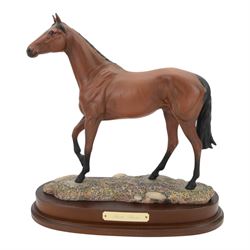 Two Royal Doulton horses, Desert Orchid and Red Rum, on wooden plinths 