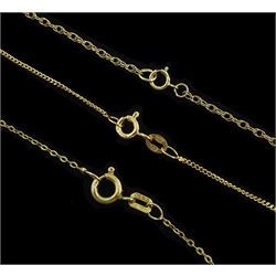 Three early 20th century 9ct gold cross pendants, with engraved decoration, on later 9ct gold chain necklaces