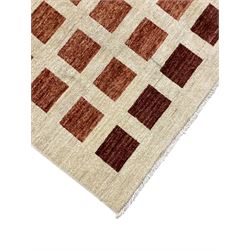 Contemporary camel ground woollen rug, decorated with gradient squares in shades of terracotta 