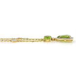 18ct gold peridot and diamond necklace, pear shaped peridot with diamond surround, suspended from a round brilliant cut peridot, on gold rubover set diamond chain, stamped 750, total peridot weight approx 4.65 carat