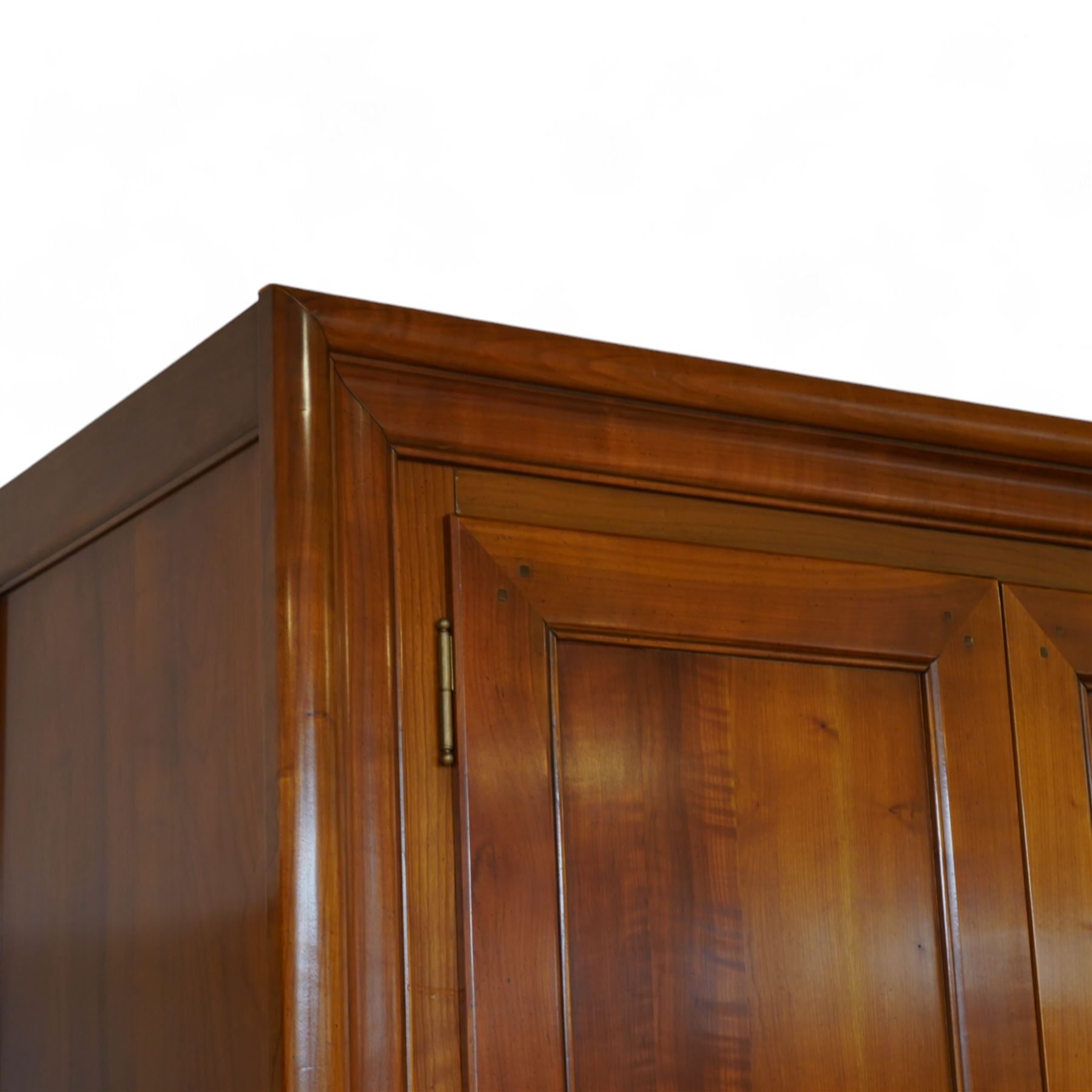 Brigitte Forestier - French cherry wood four door wardrobe unit, fitted with hanging and shelving