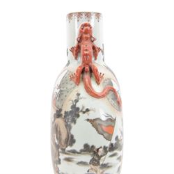 Chinese Republic period porcelain moon flask vase, of typical compressed spherical form, the neck and shoulders with applied iron red dragon handles, the body decorated in iron-red and grisaille with a 'one hundred children' design, depicting various children at play and engaged in musical pursuits within a garden setting, with apocryphal Qianlong mark beneath, H47cm