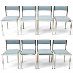 Set of eight 1980s chrome and upholstered dining chairs, curved back bar over padded seats...