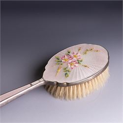 Mid 20th century silver mounted hairbrush and clothes brush, with guilloche enamel floral decoration, hallmarked Adie Brothers Ltd, Birmingham 1960, together with an silver mounted glass scent bottle, the glass with etched floral decoration and engine turned cover, hallmarked 