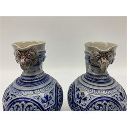 Pair of late 19th Century German Simon Peter Gerz salt glaze stone jugs, impressed mark to base, model number 550, H15cm