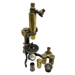 Brass monocular microscope, on a pitchfork base and with additional lenses
