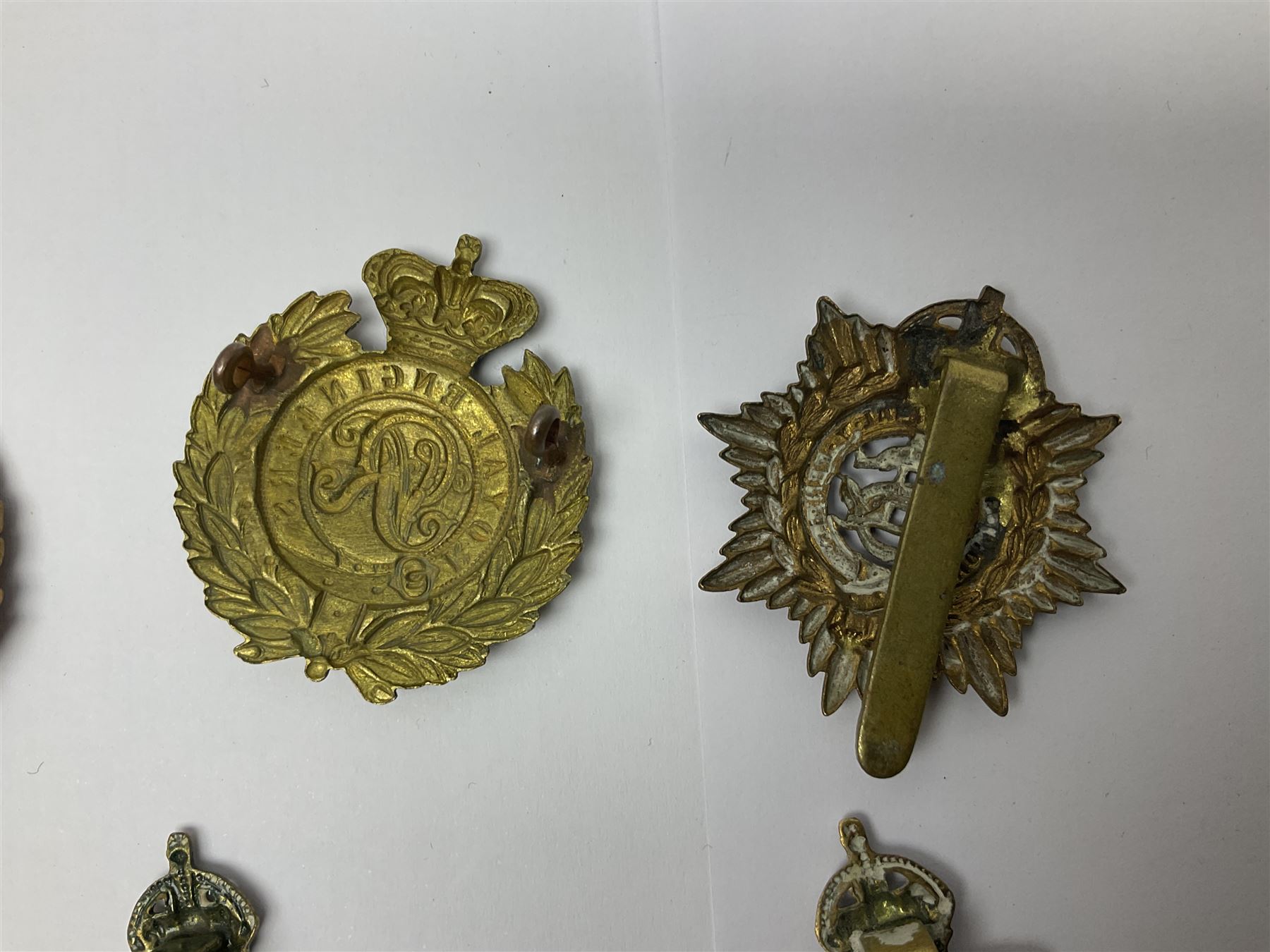 Twelve cap badges including Royal Artillery, 3rd RGA Middlesex Volunteers, Hon. Artillery Company, West Riding and Waraickshire Royal Horse Artillery, Royal Engineers and Army Service Corps (12)