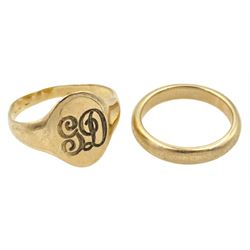 9ct gold signet ring engraved with initials 'GD' and a 9ct gold wedding band, stamped or hallmarked