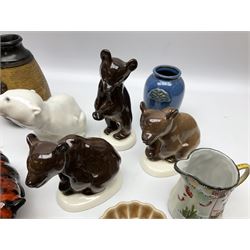 Bretby vase decorated with David Copperfield and Uriah Heep scene, collection of bear figures, to include two Beswick panda cubs, three USSR brown bear figures on white bases, Nao panda eating bamboo, USSR polar bear and panda, etc, together with Wade figures, etc