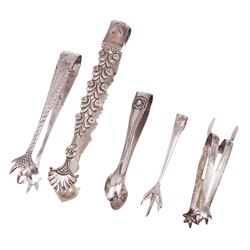 Five pairs of silver sugar tongs, including a pair with bright cut floral decoration to the tongs and palmette bowls, with engraved initials to top, stamped maker's mark TW and lion passant and three pairs with claw bowls, all hallmarked 