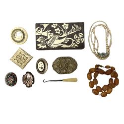 Victorian gold, ruby and diamond mourning brooch and a small collection of costume jewellery including a micro mosaic brooch,  imitation pearl necklace and an amber type beaded necklace, housed in a carved wooden box