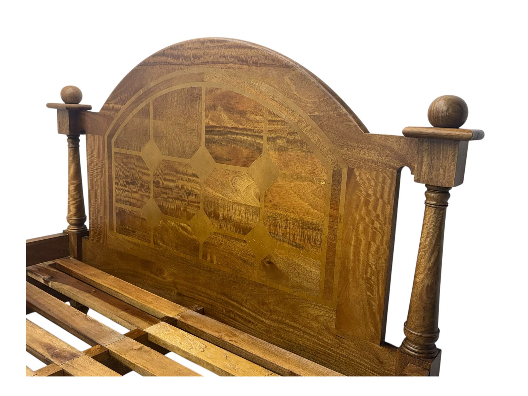 Contemporary mango wood bed frame, comprising an arched panelled headboard and footboard with inlaid geometric patterns, turned posts with spherical finials, and complete with side rails and slatted base