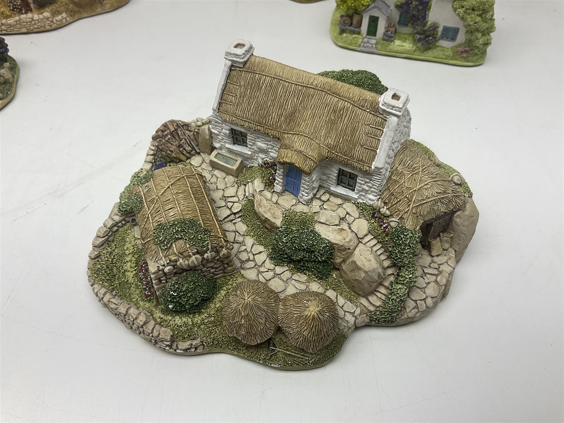 Sixteen Lilliput Lanes from the Irish Collection, to include Kilmore Quay, Causeway Cottage, Blarney Castle, Quite Cottage etc, all with boxes and deeds 