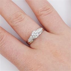 18ct white gold three stone round brilliant cut and marquise cut diamond ring, stamped, principal diamond approx 0.65 carat, total diamond weight approx 0.90 carat