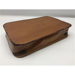 Mappin & Webb leather cased campaign gentleman's vanity set, the tan leather case opening to reveal fitted interior with five engine turned silver capped glass vanity bottles, hallmarked Mappin & Webb, London 1944, brushes, mirror etc, monogram DPK to the top of the case