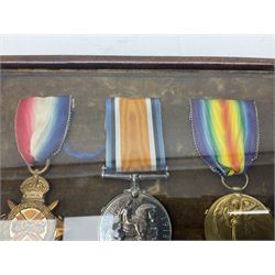 WW1 trio of medals comprising British War medal, Victory Medal and 1914-15 Star awarded to 2nd. Lieut. W. Malkin; all with ribbons and displayed in later easel frame