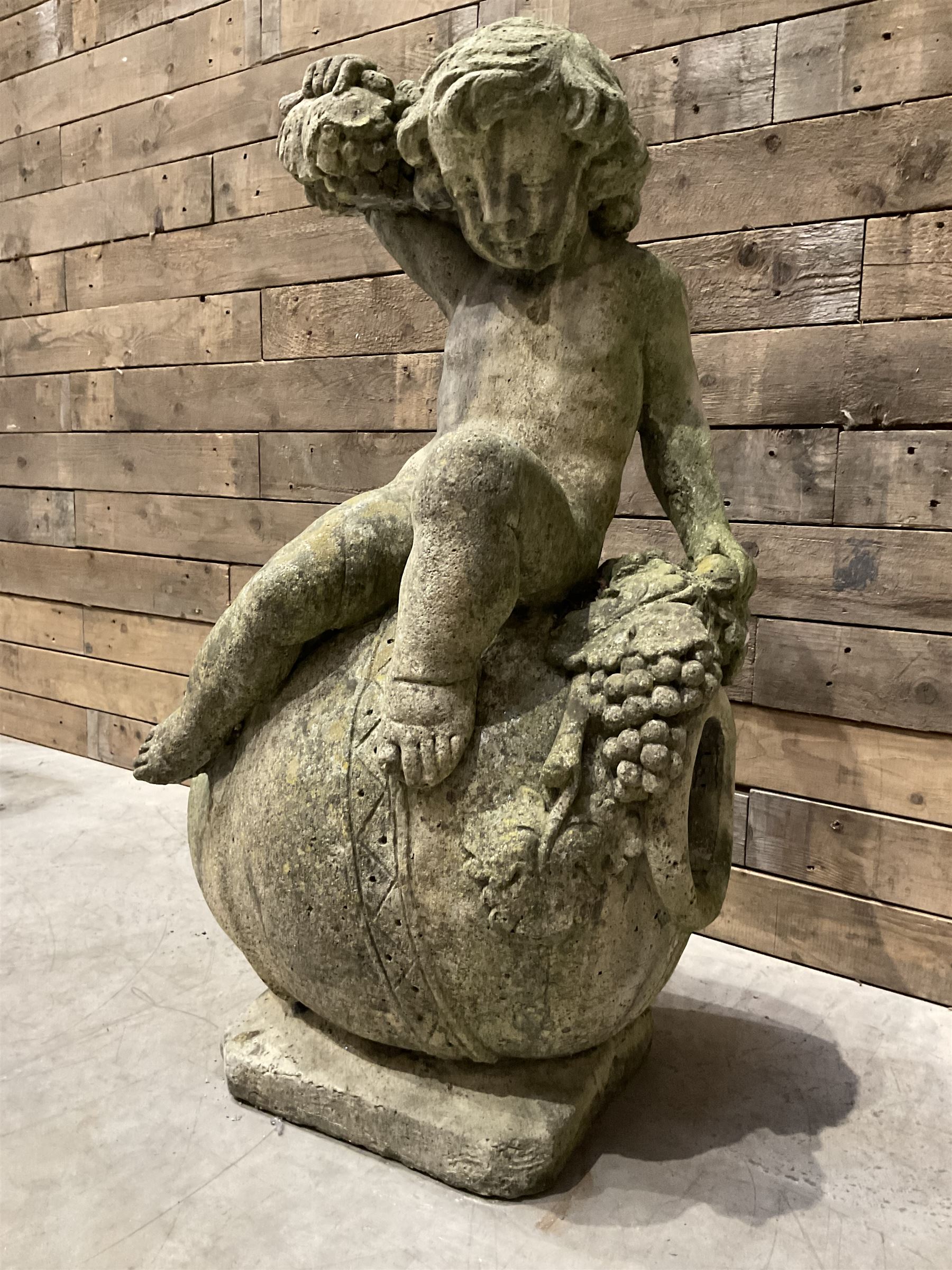 Cast stone garden figure - grape carrier on barrel