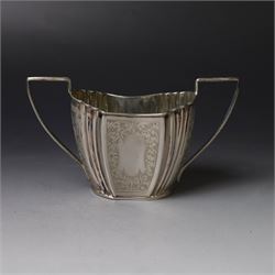 Late Victorian silver twin handled open sucrier and milk jug, of fluted form with panels o...