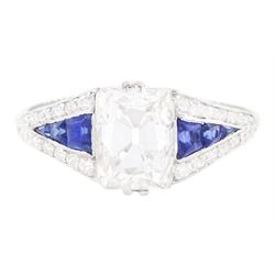 Platinum diamond and sapphire ring, the principal old cushion cut diamond of approx 1.50 c...