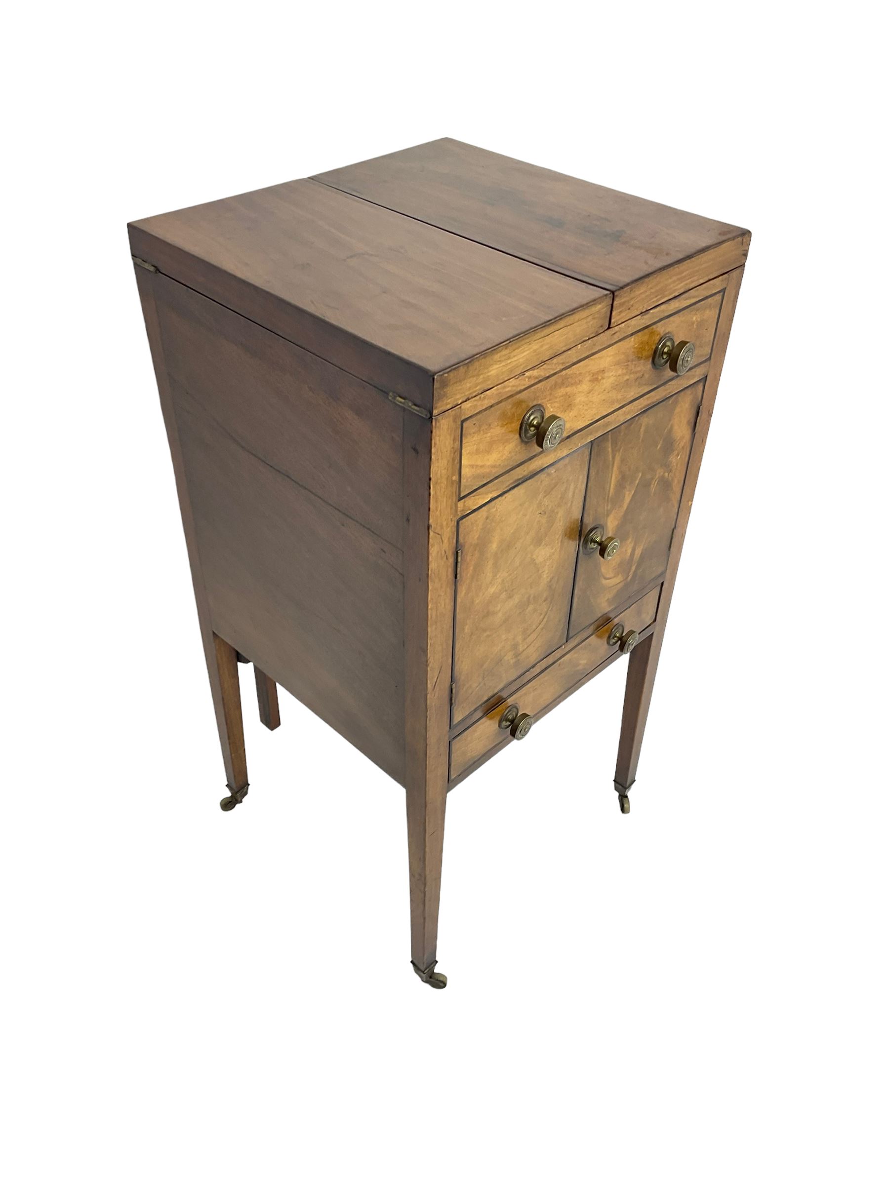 Georgian mahogany washstand cabinet, the double hinged lid opens to reveal wash basin and lift up tilting mirror, false drawer over double cupboard and drawer, on square supports with brass cups and castors