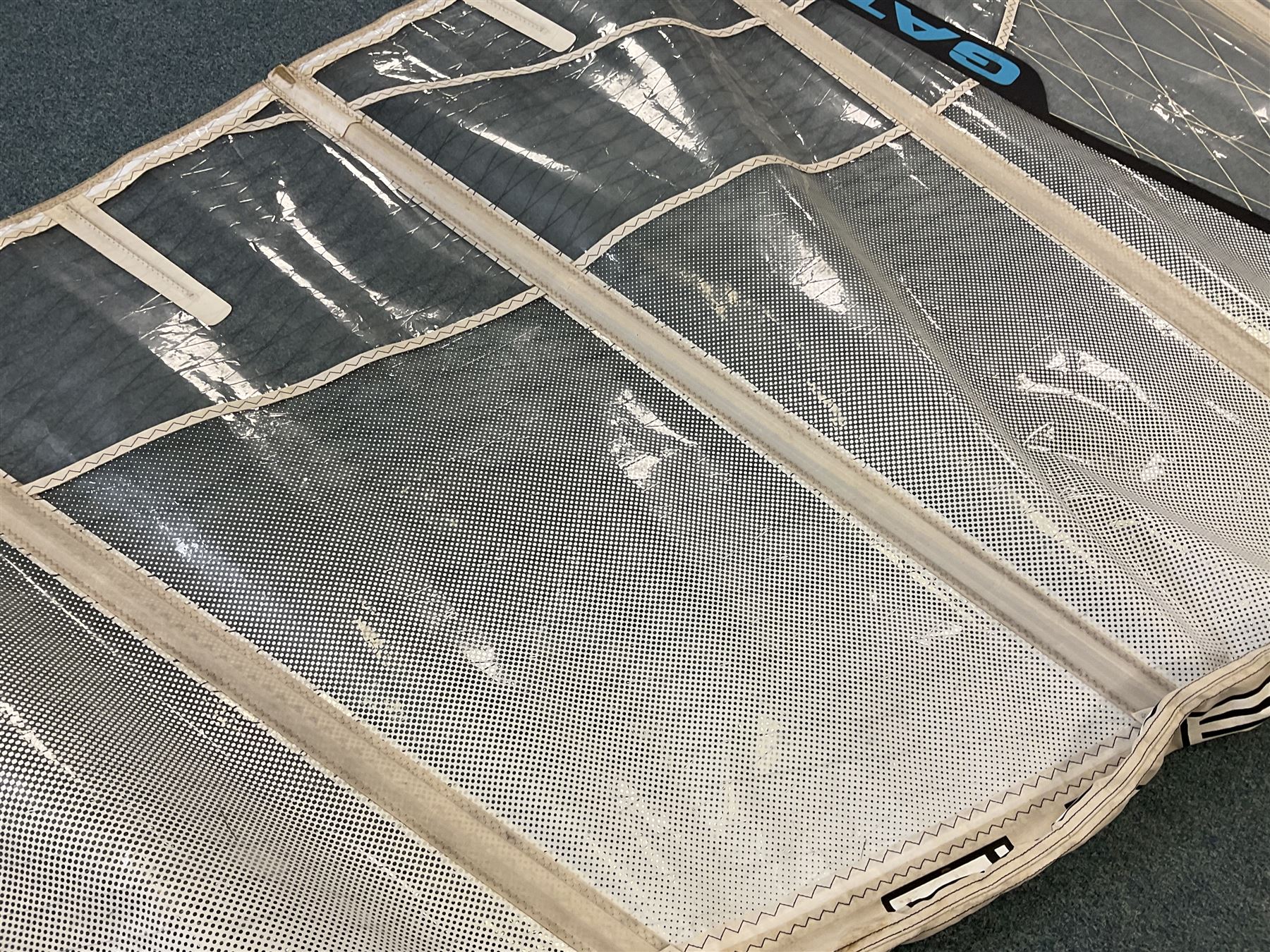 Windsurfing: Quantity of sails and masts comprising Severne Gator sail, mast 430/21 size 6.0, luff 453, boom 182, carbon Redline Severne 430 RDM mast, Tushingham Rock sail and Tushingham Free Wave mast, Tunshingham The Rock 4.2 sail, some with carrying cases, together with other equipment to include Severne Wave Grenade extension, other extensions etc