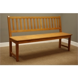  Light oak bench with moulded rectangular seat, square tapering supports with stretchers, W159cm  