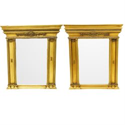 Pair of Victorian gilt pier mirrors, with projecting cornices over acanthus and foliate ca...