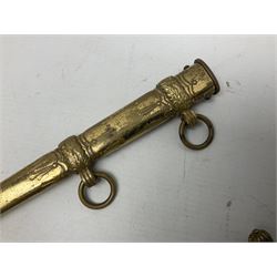 WW2 German kreigsmarine style dagger composed from various age parts, the post-war 25cm double fullered blade  with etched decoration and inscribed WKC with knight's head; in gilt brass scabbard with two rings L42cm overall