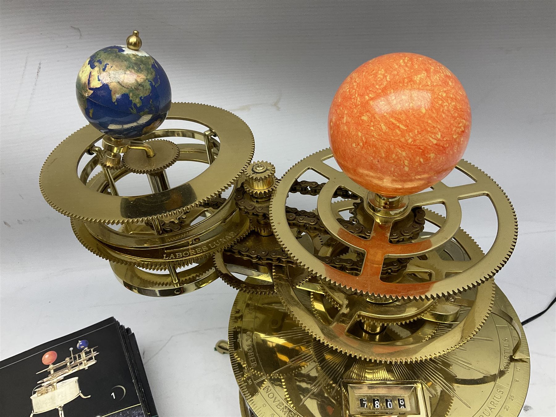 Modern kit-built brass working Tellurion, de-luxe model with astrological signs and illuminated sun H33cm; with set of fifty-two construction periodicals