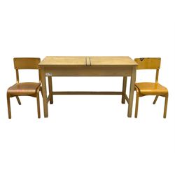 Mid-20th century beechwood school desk, rectangular lift-top desk with storage compartment, supported by square legs with cross stretchers; two matching beech chairs (3)