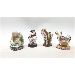 A group of four Royal Worcester candle snuffers from The Connoisseur Collection, comprising Sleeping Buddha, Chinese year of the Monkey, Chinese year of the Horse, and Chinese year of the Sheep, each with printed marks beneath, tallest H9cm.   