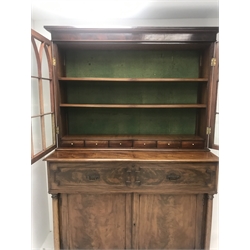 Early 19th century and later mahogany secretaire bookcase, two astragal glazed doors above fall front compartment enclosing fitted interior, two cupboards flanked by turned columns, plinth base, W144cm, H208cm, D55cm