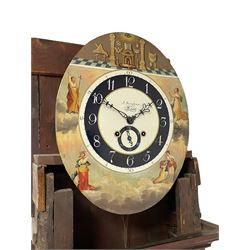 John Stonehouse of Leeds - mahogany 8-day longcase clock with a painted oval dial c1830, hood with a swans necked pediment and profuse contrasting inlay to both the hood and case, oval hood door with flanking pilasters and Corinthian capitals, conforming case with canted corners and short triple spire door, broad plinth with matching inlay and canted corners on shallow base, dial depicting masonic regalia, symbols, and pictorial depictions of the humanities, faith, hope, charity and righteousness, black chapter with white roman Arabic’s, date recorder and matching “crown” hands, dial pinned to a rack striking movement with a recoil anchor escapement, striking the hours on a coiled underslung gong. With weights and gridiron pendulum. 
This clock case is of large, impressive dimensions and was almost certainly commissioned for a large masonic lodge in Leeds, a rare and unique example.