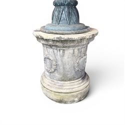 Large impressive Classical cast bronze center-piece urn, twin scroll handles with grape garlands, cherub masks and relief detail, raised on a circular cast stone pedestal with moulded detail