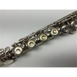 Boosey & Hawkes London Regent three-piece flute, serial no.345447; in B&H Bandhite hard carrying case; and Deg Music Company Inc. USA Claudel Model three-piece flute, serial no.491718, in hard carrying case (2)