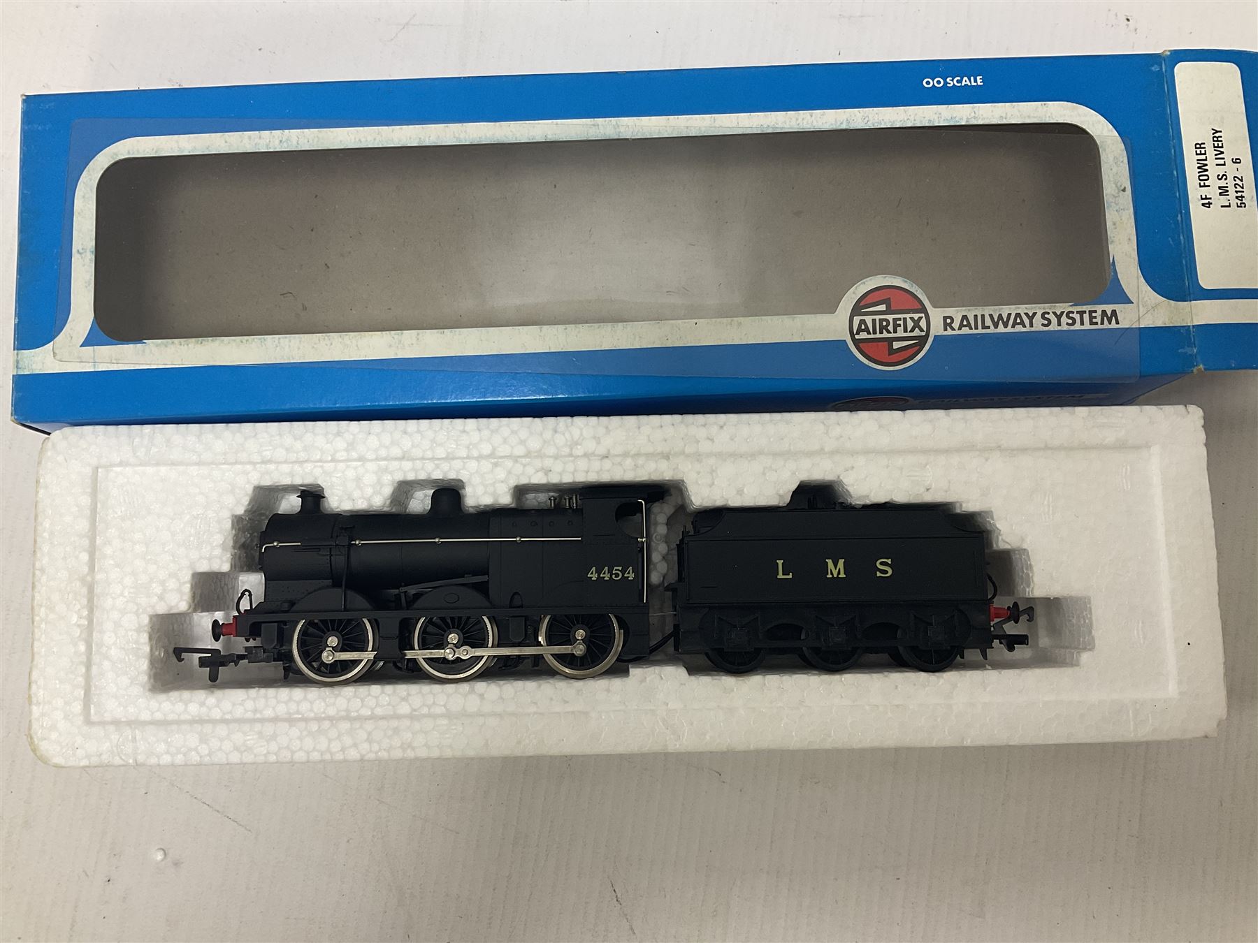 Various makers ‘00’ gauge - four locomotives comprising Mainline Railways ref.37060 Rebuilt Scot Class ‘Royal Scot’ 4-6-0 no.6100 in LMS crimson; Airfix Royal Scot Class ‘Royal Scots Fusiliers’ 4-6-0 no.6103 in LMS black and Class 4F Fowler 0-6-0 no.4454 in LMS black; Lima Class 08 Diesel 0-6-0 Shunting no.7120 in LMS black; all in original boxes (4)