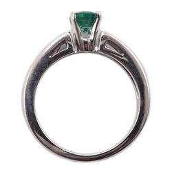  18ct white gold oval emerald ring, with round brilliant cut diamond shoulders, emerald approx 1 carat  