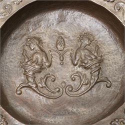 18th century Venetian copper two handled brazier, the base embossed with figures emerging from a cornucopia and a bishop's mitre, the border with embossed scrolls etc D50cm