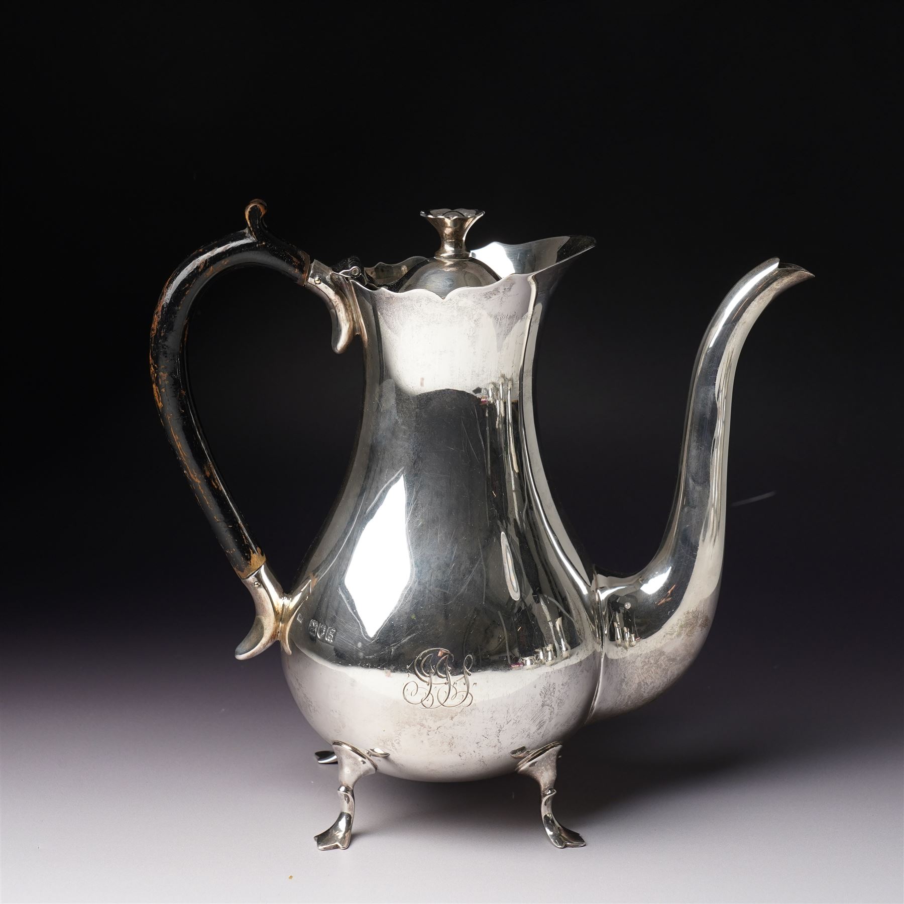 Silver matched five piece tea and coffee set of baluster form engraved with a monogram on shaped supports Sheffield 1913, the teapot 1911, the coffee pot 1924 Maker Mappin & Webb