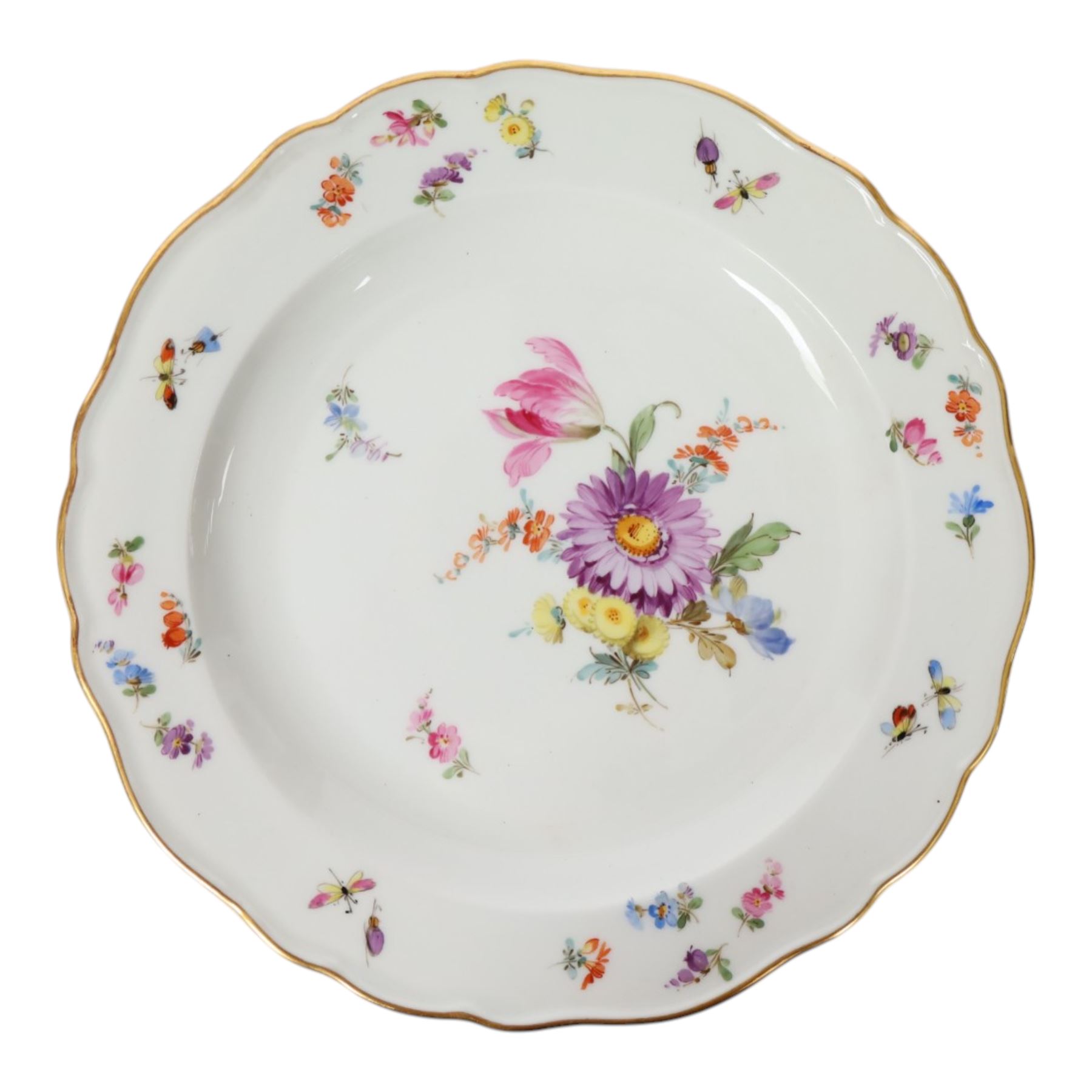 Four early 20th Century Meissen plates, hand painted with floral sprays, sprigs and inspects, with underglaze blue cross sword mark beneath, D21.5cm