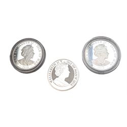 Three Queen Elizabeth II Isle of Man one ounce fine silver coins, comprising 2016, 2018 one angels and 2018 one noble 