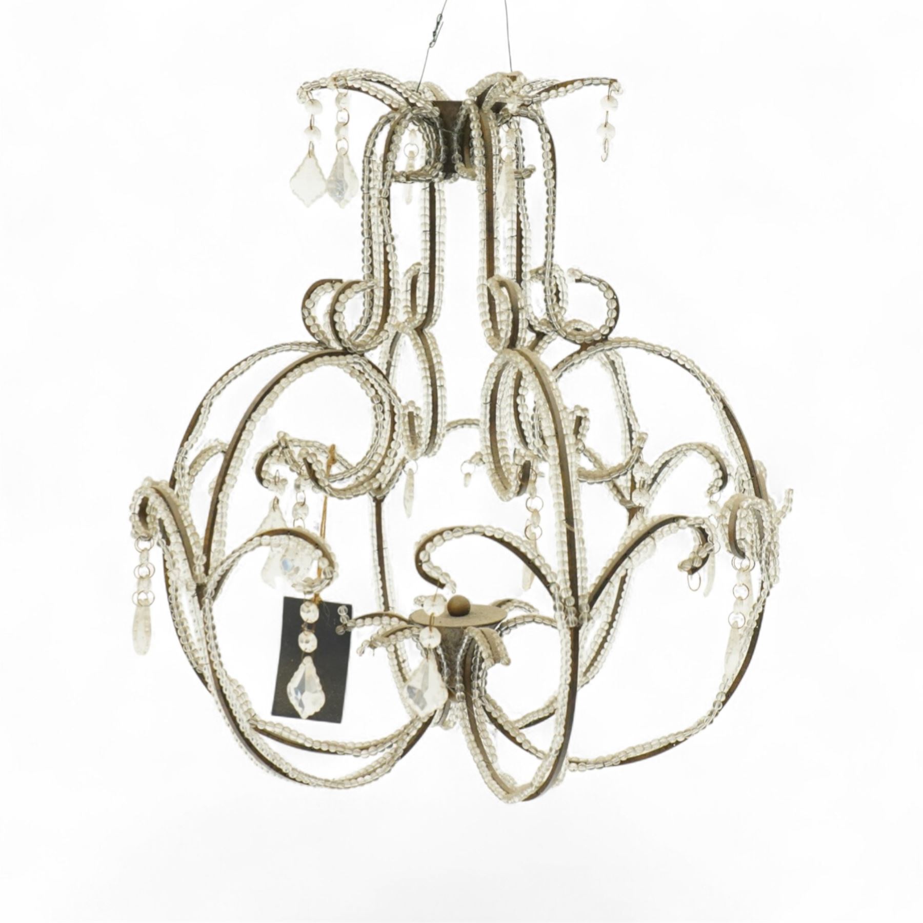 Contemporary decorative hanging chandelier frame, openwork painted metal scroll frame, with applied clear bead borders and hanging faceted glass pendants