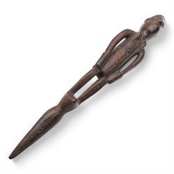 African Colonial carved hardwood staff finial, the male figure in military dress, L66cm, African Fang weaving tool and a woven basket (3)