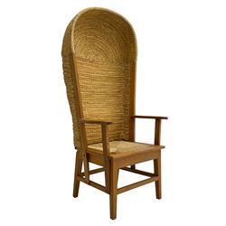 Reynold Eunson (1932–1978) for David Munro Kirkness, Kirkwall, Orkney - oak framed Orkney chair, woven straw canopy back, drop-in rush seat, the arm terminals carved with scrolls, on square tapering supports joined by plain stretchers, the front rail inscribed with makers marks