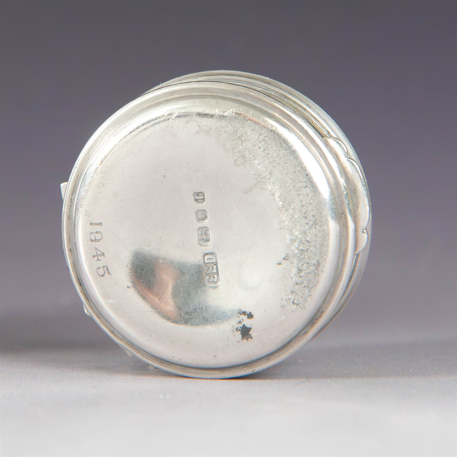 Late Victorian silver jar with cover, of cylindrical form with  domed cover engraved with initials, hallmarked Charles & George Asprey, together with a small ecclesiastical trinket box, engraved with cross to cover and with personal engraving beneath, hallmarked Edgar Ernest Davis, London 1944, taller jar H6cm