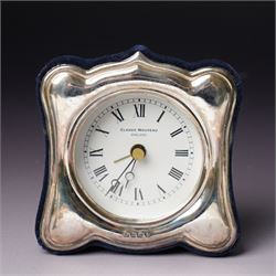 Tiffany silver teething ring marked 'Tiffany sterling 925', boxed, Junghans bedside clock in silver mounted frame, pair of silver sauce ladles and a silver knife